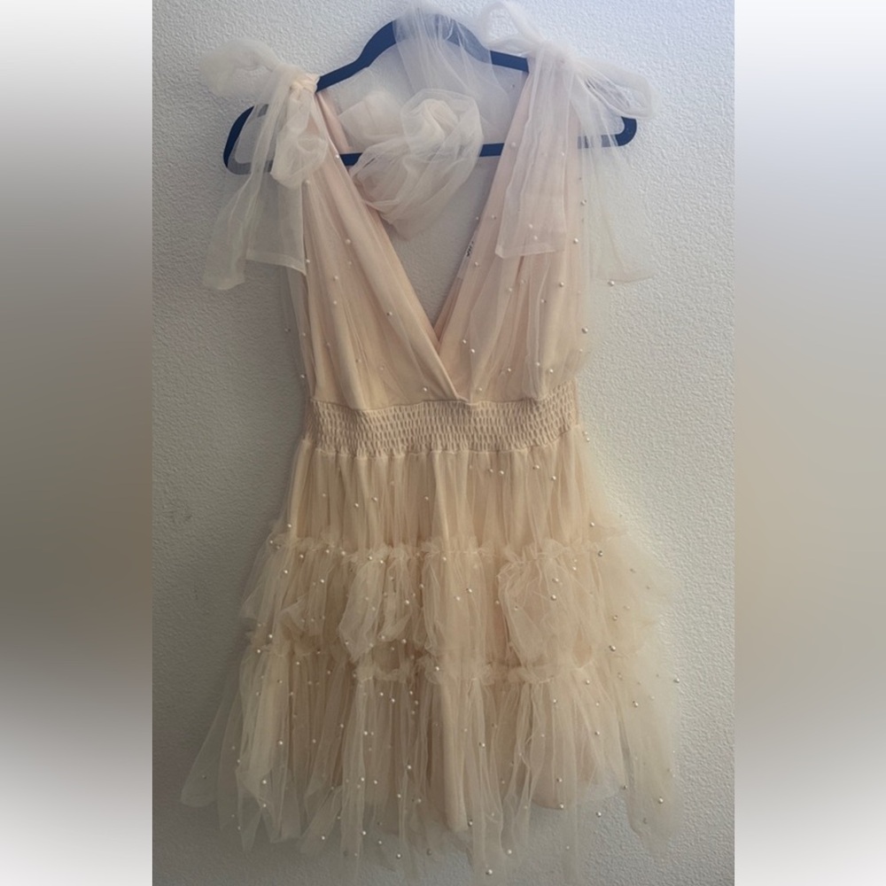 Cream colored pearl mini dress